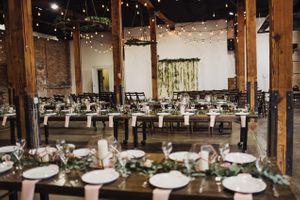 Bistro Lighting Over Elegantly-Set, Rustic, Wooden Tables Details