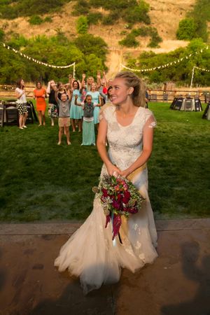 Hoopes Events | Tori and Sterling | Quiet Meadow Farms | Mapleton Utah | Bride Tosses the Bouquet Tori_Sterling_Quiet_Meadow_Farms_Mapleton_Utah_Bride_Tosses_the_Bouquet.jpg