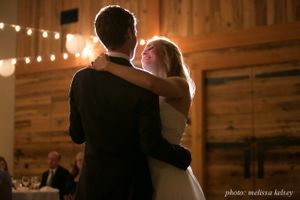Hoopes Events | Lenora and John | Sundance Resort | Sundance Utah | Bride and Groom Dancing Under Bistro Lights and Chinese Lanterns Lenora_John_Sundance_Resort_Sundance_Utah_Bride_Groom_Dancing.jpg