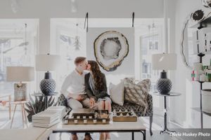 Lexie_Neil_Park_City_Utah_Engagement_Bride_Groom_Kissing_on_Couch.jpg