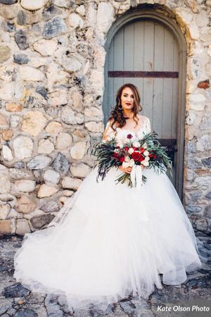 Bride with Stone Building Backdrop Bride