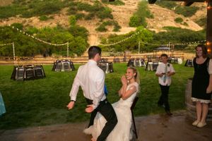 Hoopes Events | Tori and Sterling | Quiet Meadow Farms | Mapleton Utah | Groom Approaches Bride to Get the Garter Tori_Sterling_Quiet_Meadow_Farms_Mapleton_Utah_Groom_Approaches_Bride_For_Garter.jpg