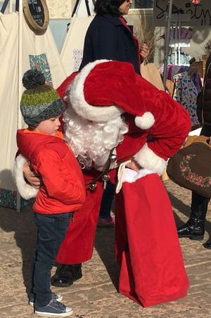 Hoopes Events | Zermatt Swiss Christmas | 2017 | Zermatt Utah Resort | Midway Utah | Santa With a Shy Fan Zermatt_Swiss_Christmas_2017_Zermatt_Utah_Resort_Midway_Utah_Shy_Fan.jpg