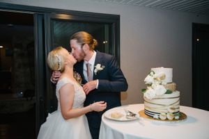 Hoopes Events | Tasha and Chip | Salt Lake City Utah | Couple Kissing After Cake Cutting Tasha_Chip_Salt_Lake_City_Utah_Couple_Kissing_After_Cake_Cutting.jpg