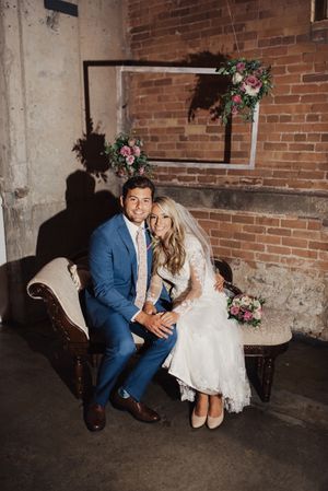 Couple Seated on Swan Fainting Couch Group Portraits