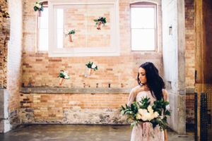 Hoopes Events | Modern Industrial Shoot | The Historic Startup Building | Provo Utah | Bride with Hanging Vases in the Background Modern_Industrial_Wedding_Shoot_The_Historic_Startup_Building_Provo_Utah_Bride_Hanging_Vases.jpg
