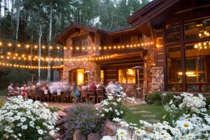 Hoopes Events | Evelyn and Kevin | Park City Utah | Reception Dinner with the Warm Glow of Overhead Bistro Lights Evelyn_Kevin_Park_City_Utah_Bistro_Lighted_Reception_Dinner.jpg