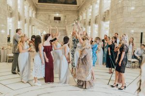 Guests getting ready to catch the bouquet Reception