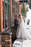 Ilana_Dave_Canyon_Resort_Park_City_Utah_Bride_and_Groom_Kissing_Outside-Lodge.jpg
