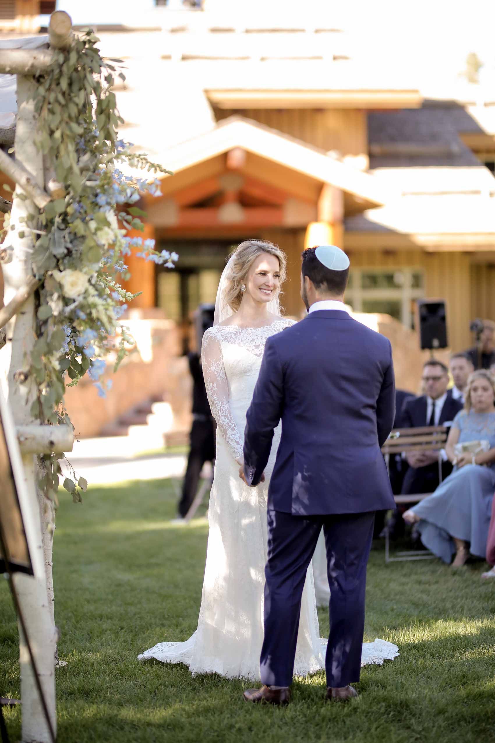 Bride and Groom in Front of Chuppah Ceremony