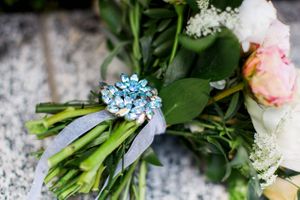Hoopes Events | Tessa and Taani | Utah State Capitol | Salt Lake City Utah | Details | Bridal Bouquet With Ice Blue Pin Tessa_Taani_Utah_State_Capitol_Salt_Lake_City_Utah_Bridal_Bouquet_Detail_Ice_Blue_Pin.jpg