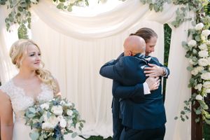 Hoopes Events | Tasha and Chip | Salt Lake City Utah | Groom Getting a Congratulatory Hug Tasha_Chip_Salt_Lake_City_Utah_Groom_Getting_Hug.jpg