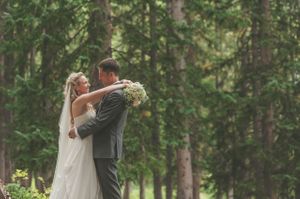 Bride and Groom Embracing Couple