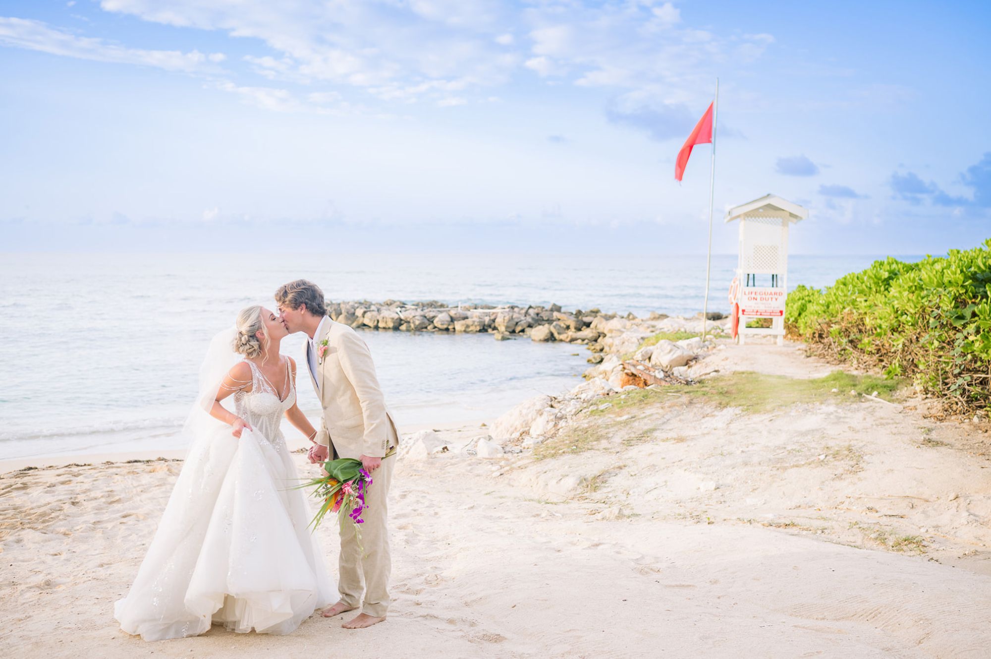 Couple Kissing on Beach