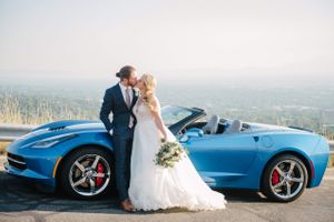 Hoopes Events | Tasha and Chip | Salt Lake City Utah | Bride and Groom Kissing in Front of Shiny Blue Corvette Tasha_Chip_Salt_Lake_City_Utah_Bride_Groom_Kissing_Shiny_Blue_Corvette.jpg