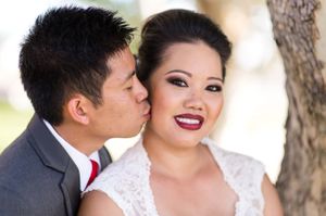 Bride Gets a Kiss From the Groom Bride and Groom