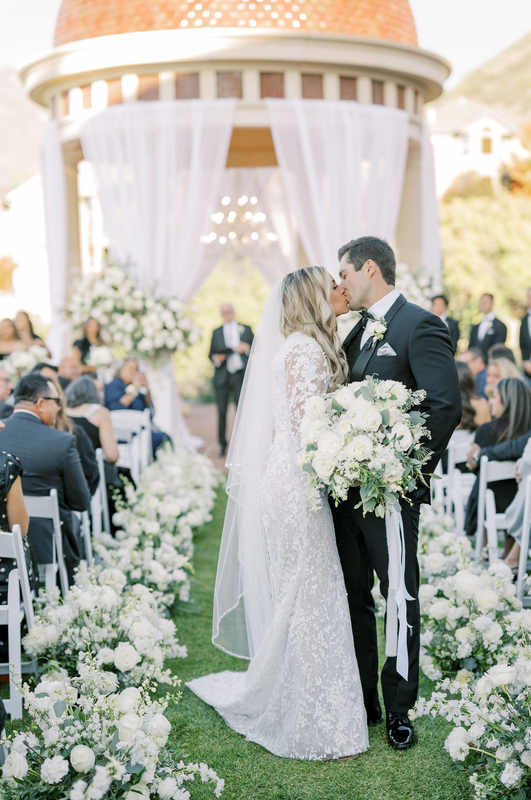 Kissing Bride and Groom