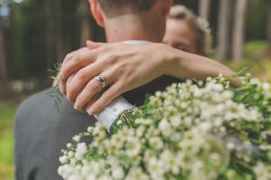 Bride's Ring and Bouquet Detail Couple
