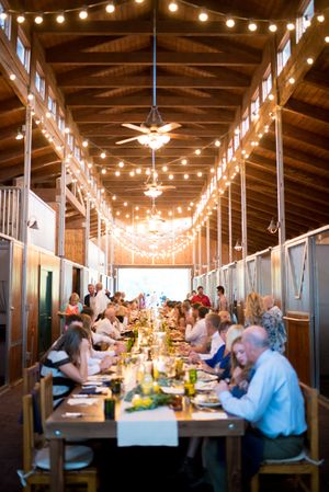 Hoopes Events | Chelsea and Walker | Red Cliff Ranch | Heber City Utah | Eating the Reception Dinner in the Bistro Lighted Barn Chelsea_Walker_Red_Cliff_Ranch_Heber_City_Utah_Eating_In_the_Barn.jpg