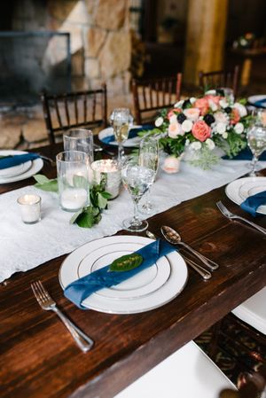 Hoopes Events | Rocky Mountain Bride | Winter Elopement | Deer Valley | Empire Lodge | Park City Utah | Elegant Table Setting with Blue Napkins Rocky_Mountain_Bride_Winter_Elopement_Deer_Valley_Empire_Lodge_Deer_Valley_Resort_Park_City_Utah_Table_Detail_Elegant_Table_Setting_Ashleigh_Leaf.jpg