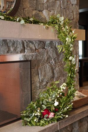 Greenery-Draped Fireplace Decor