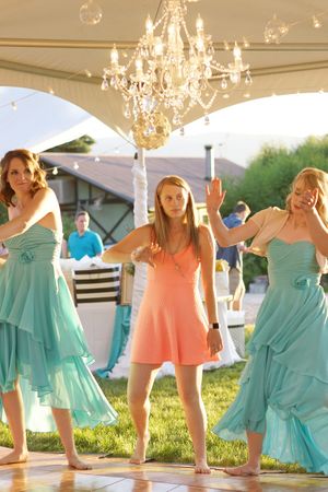 Hoopes Events | Aspyn and Steven | Bear Lake Utah | Bridesmaids Dancing Under Chandelier Aspyn_Steven_Bear_Lake_Utah_Bridesmaids_Dancing_Chandelier.jpg