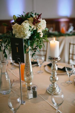 Hoopes Events | Chloe and Austin | Ben Lomond Suites | Ogden Utah | The Great Gatsby Wedding | Centerpiece Detail of White Roses and Lighted Candle Chloe_Austin_Ben_Lomond_Suites_Ogden_Utah_Great_Gatsby_Centerpiece_Detail_White_Roses.jpg