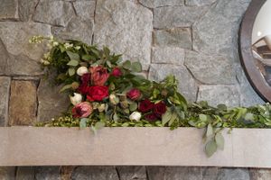 Greenery and Rose Accented Mantlepiece Decor