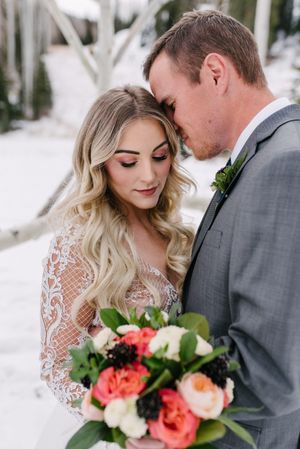 Hoopes Events | Rocky Mountain Bride | Winter Elopement | Deer Valley | Empire Lodge | Park City Utah | Bride and Groom with Coral and Blush Bridal Bouquet Rocky_Mountain_Bride_Winter_Elopement_Deer_Valley_Empire_Lodge_Deer_Valley_Resort_Park_City_Utah_Bride_Groom_Bridal_Bouquet.jpg