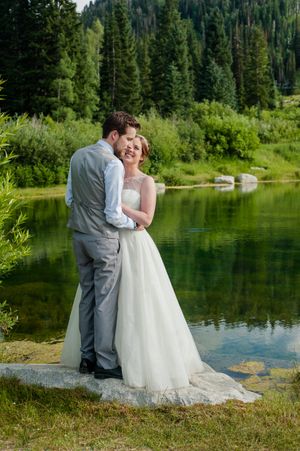 Hoopes Events | Ashley and Dan | Solitude Resort | Solitude Utah | Bride and Groom Embracing Near Mountain Lake Ashley_Dan_Solitude_Resort_Solitude_Utah_Bride_Groom_Embracing_Near_Mountain_Lake.jpg
