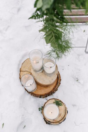 Hoopes Events | Rocky Mountain Bride | Winter Elopement | Deer Valley | Empire Lodge | Park City Utah | Ceremony Decor with Greenery and Lighted Cylinder Candles Rocky_Mountain_Bride_Winter_Elopement_Deer_Valley_Empire_Lodge_Deer_Valley_Resort_Park_City_Utah_Ceremony_Decor_Greenery_Lighted_Cylinder_Candles.jpg