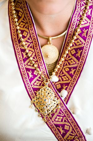 Ornate Gold Bridal Necklace With Purple and Gold Collared Dress Bride